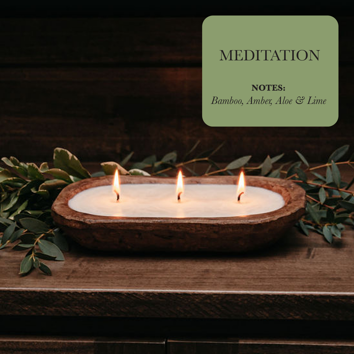 Three candles in a wooden holder with green leaves on a dark background, labeled 'Meditation' with notes.