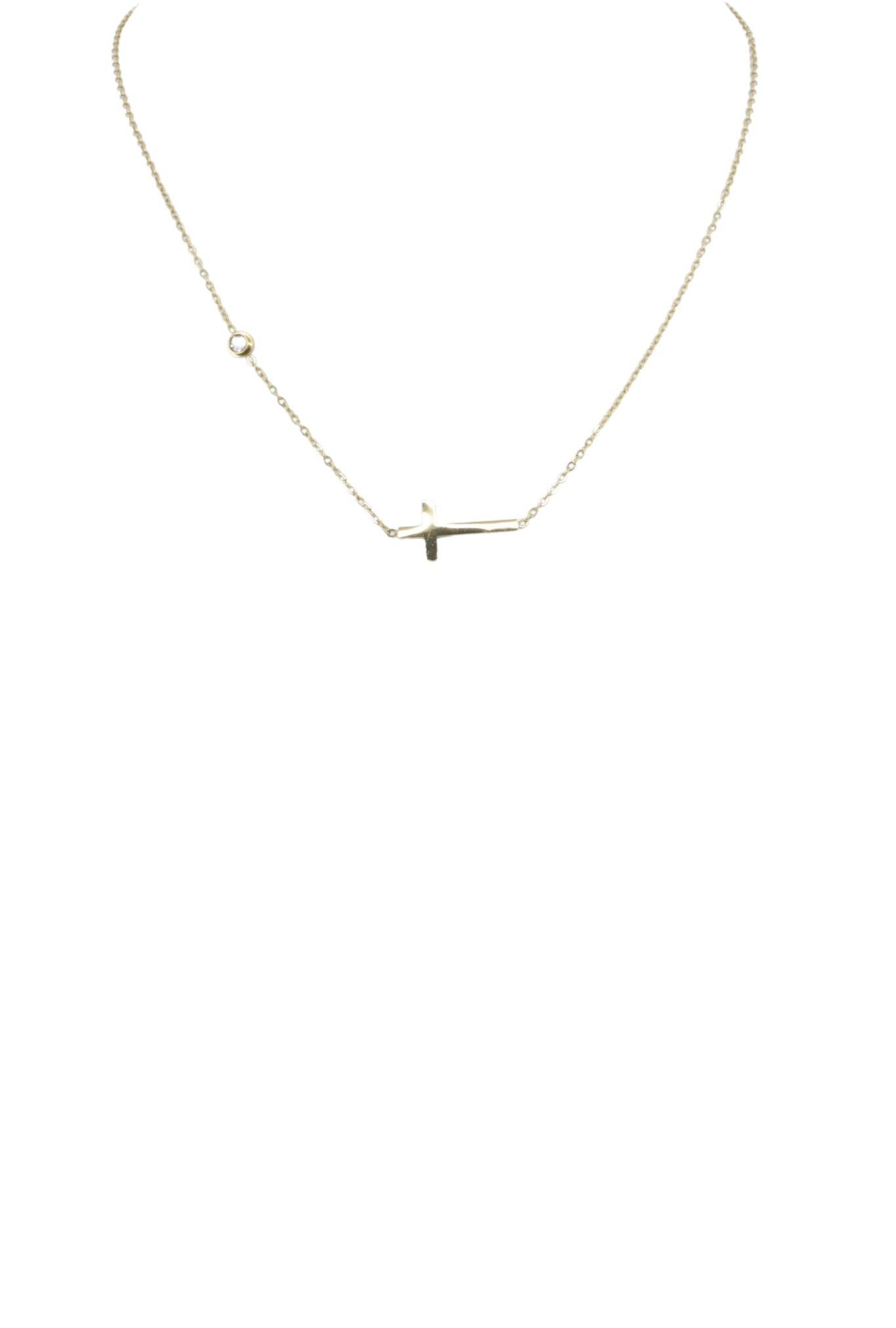 Necklace with a small cross pendant on a white background