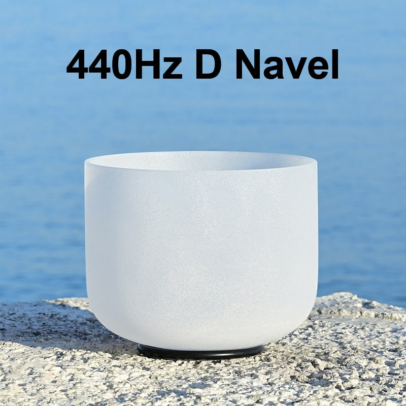 White crystal singing bowl with '440Hz D Navel' text against a blue water background