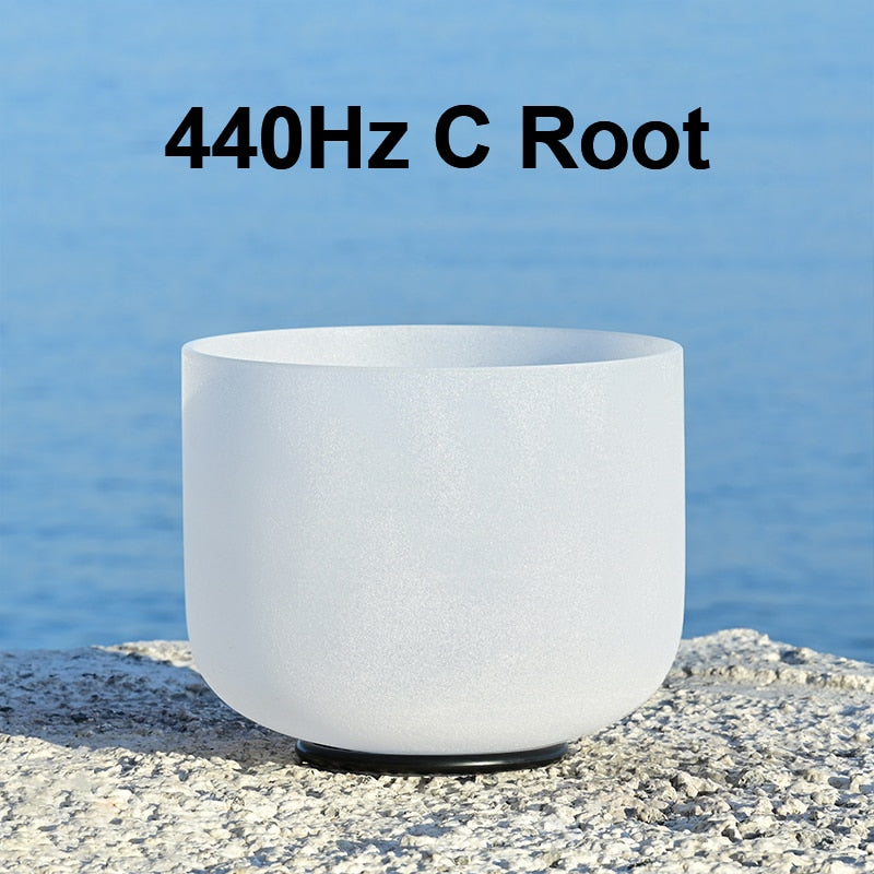 White singing bowl with '440Hz C Root' text against a blue water background