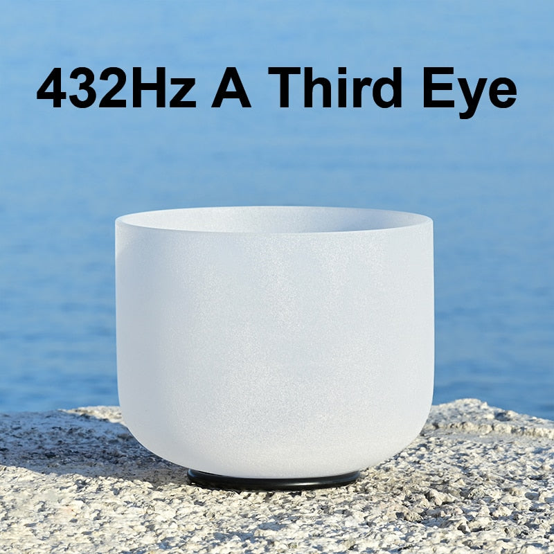 White crystal singing bowl with text '432Hz A Third Eye' against a blue water background