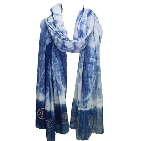 Blue and white tie-dye scarf with gold patterns on a white background