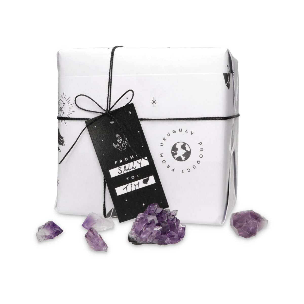 Gift box with purple crystals on a white background