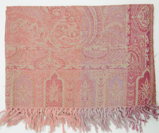 Pink and white patterned scarf with fringes on a white background