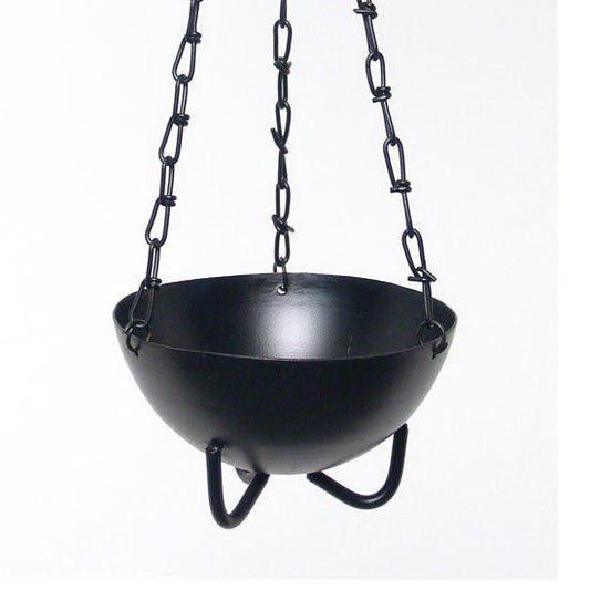 Black metal hanging cauldron with chains on a white background
