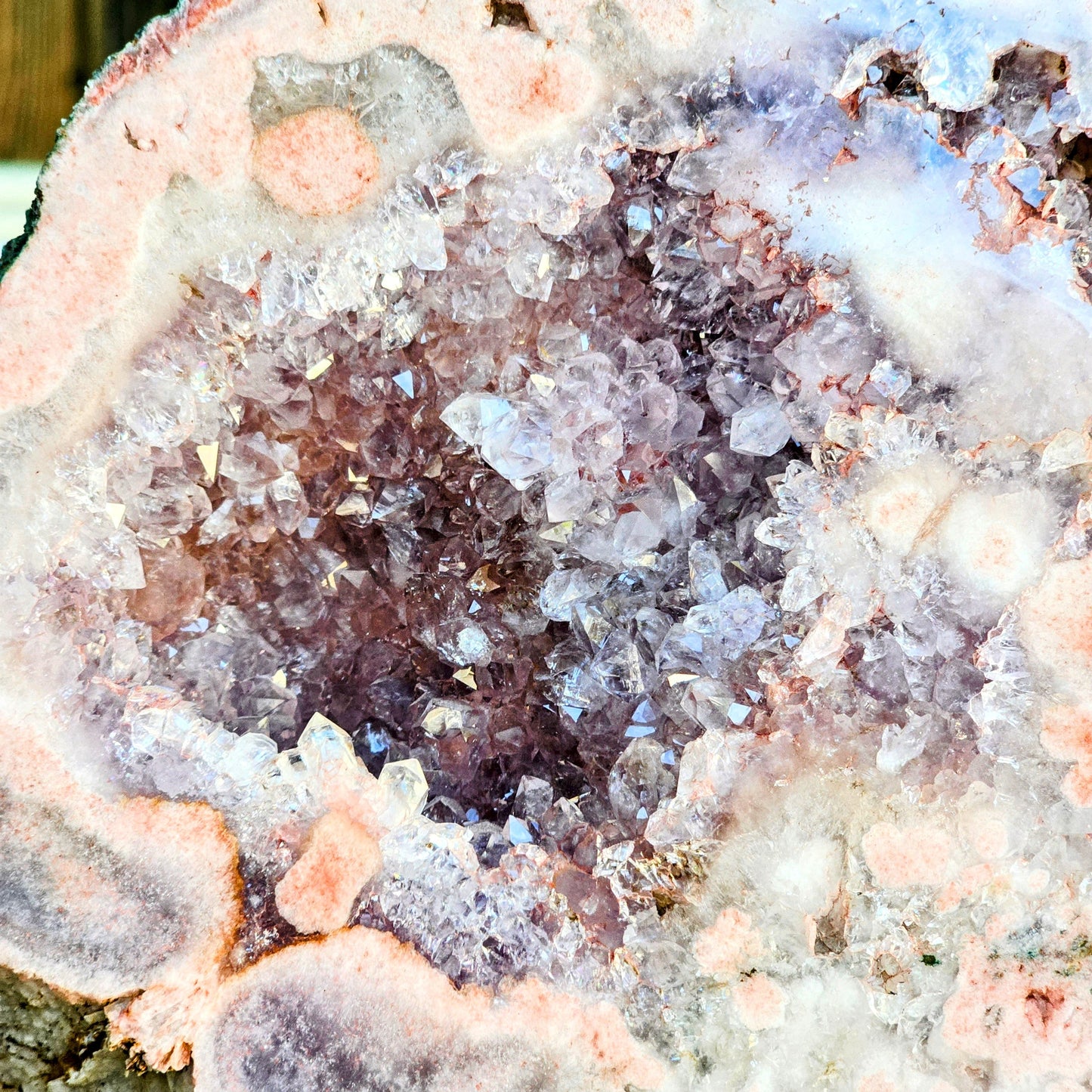 Close-up of a crystal formation with pink and white colors