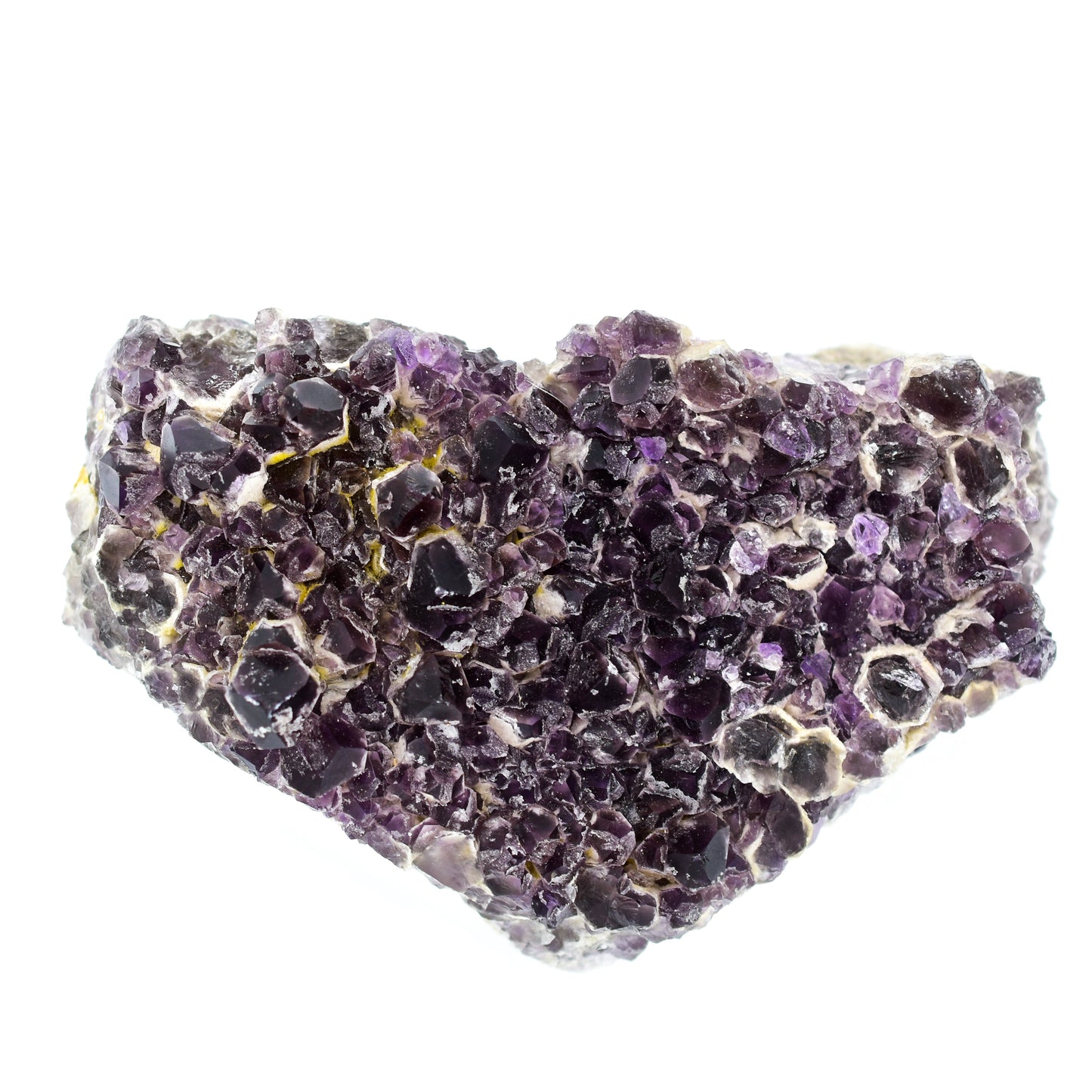 Amethyst crystal cluster on a white background