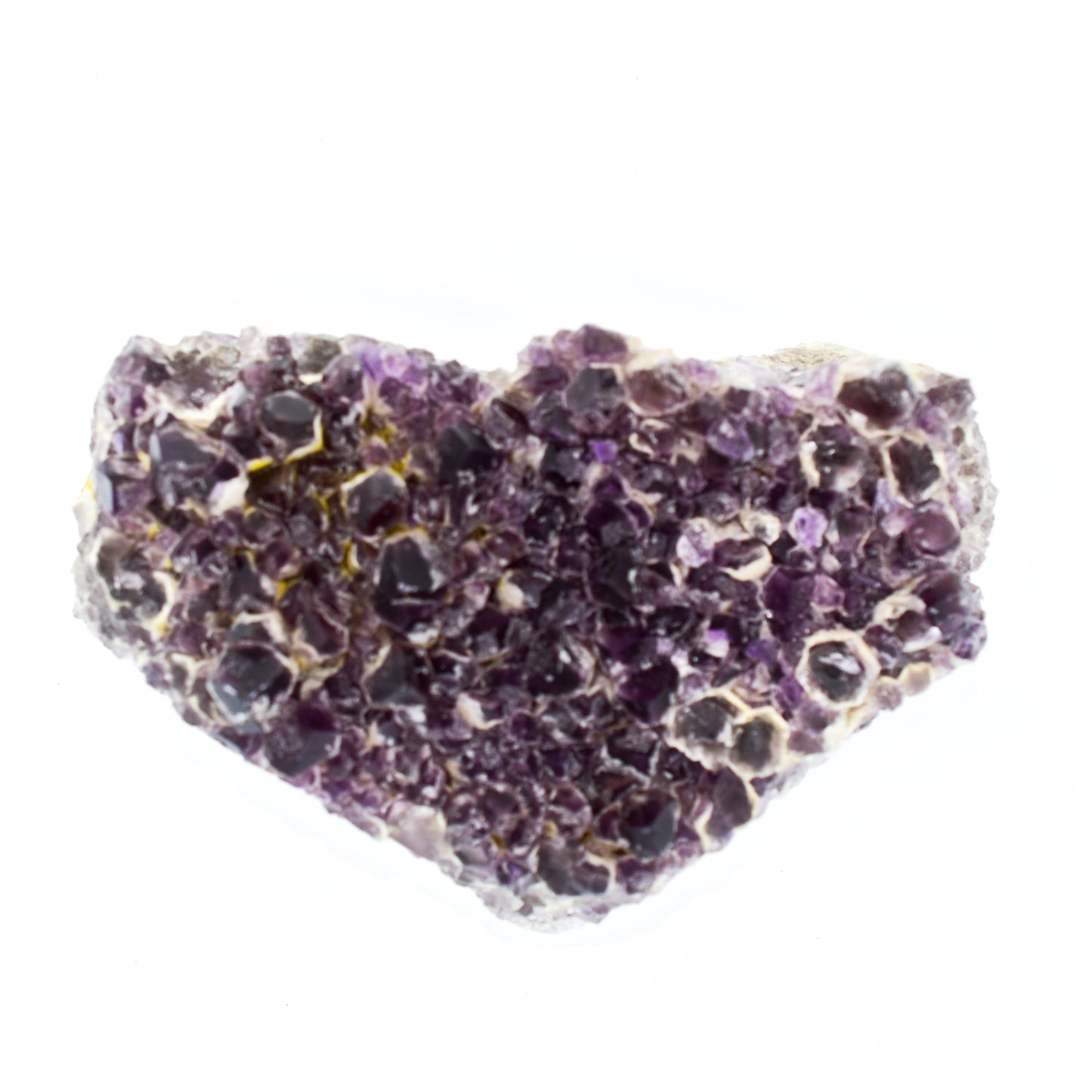 Amethyst crystal cluster on a white background