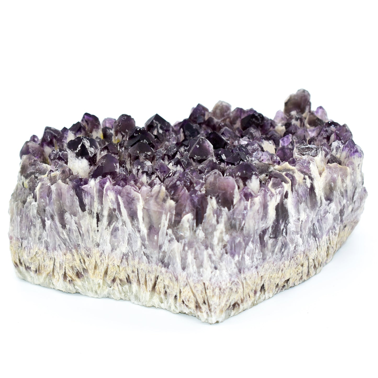 Amethyst crystal formation on a white background