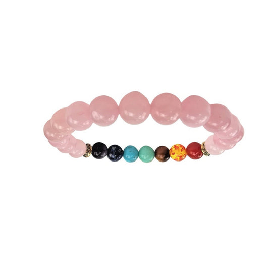 Multicolored chakra beaded bracelet with pink rose quartz beads on a white background