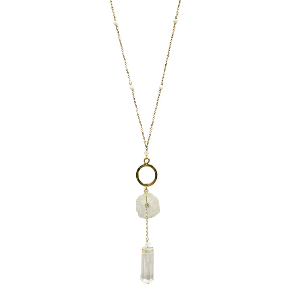 Necklace with circular pendant and crystal elements on a white background