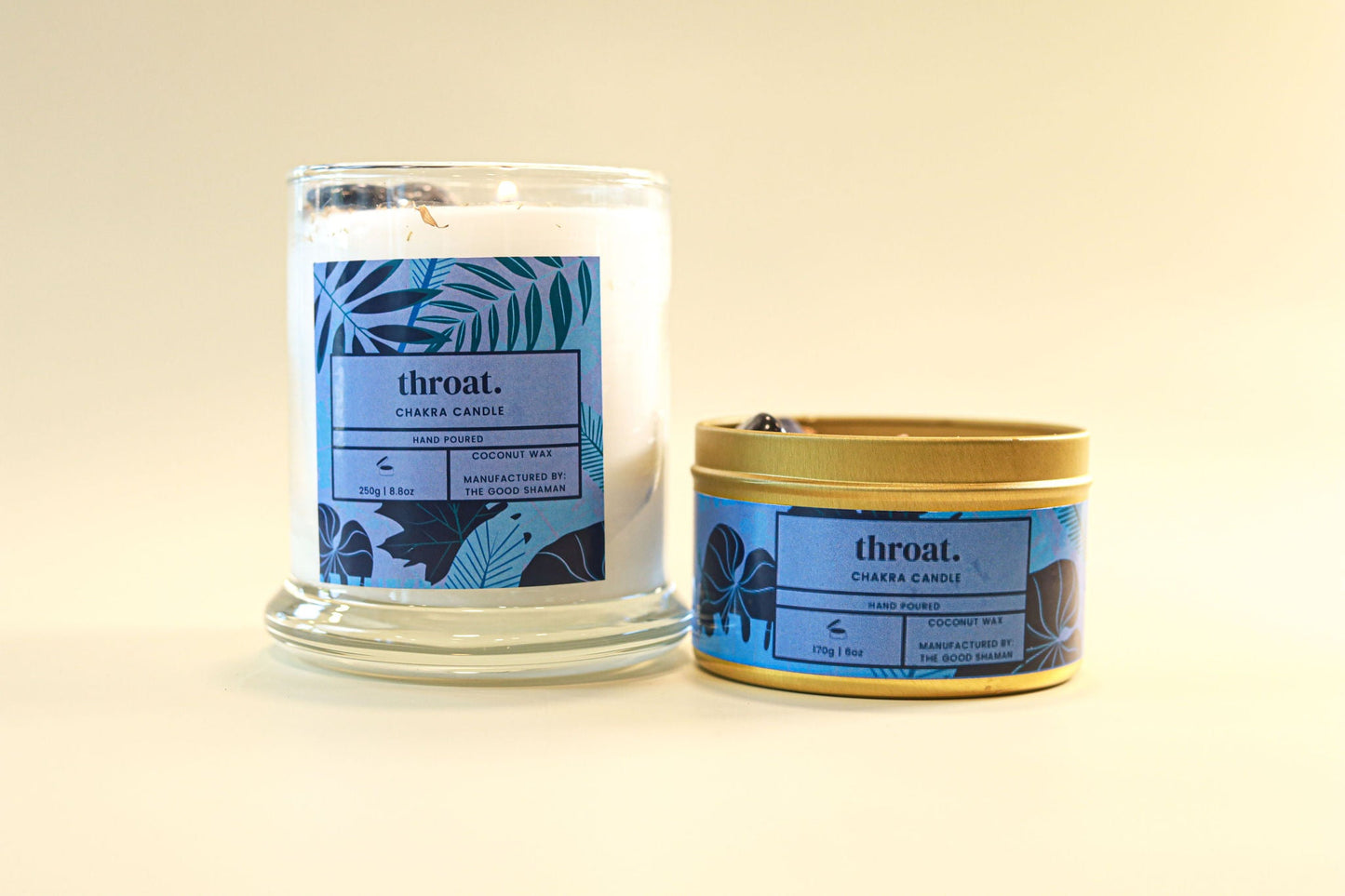 Candle and tin labeled 'throat' on a beige background
