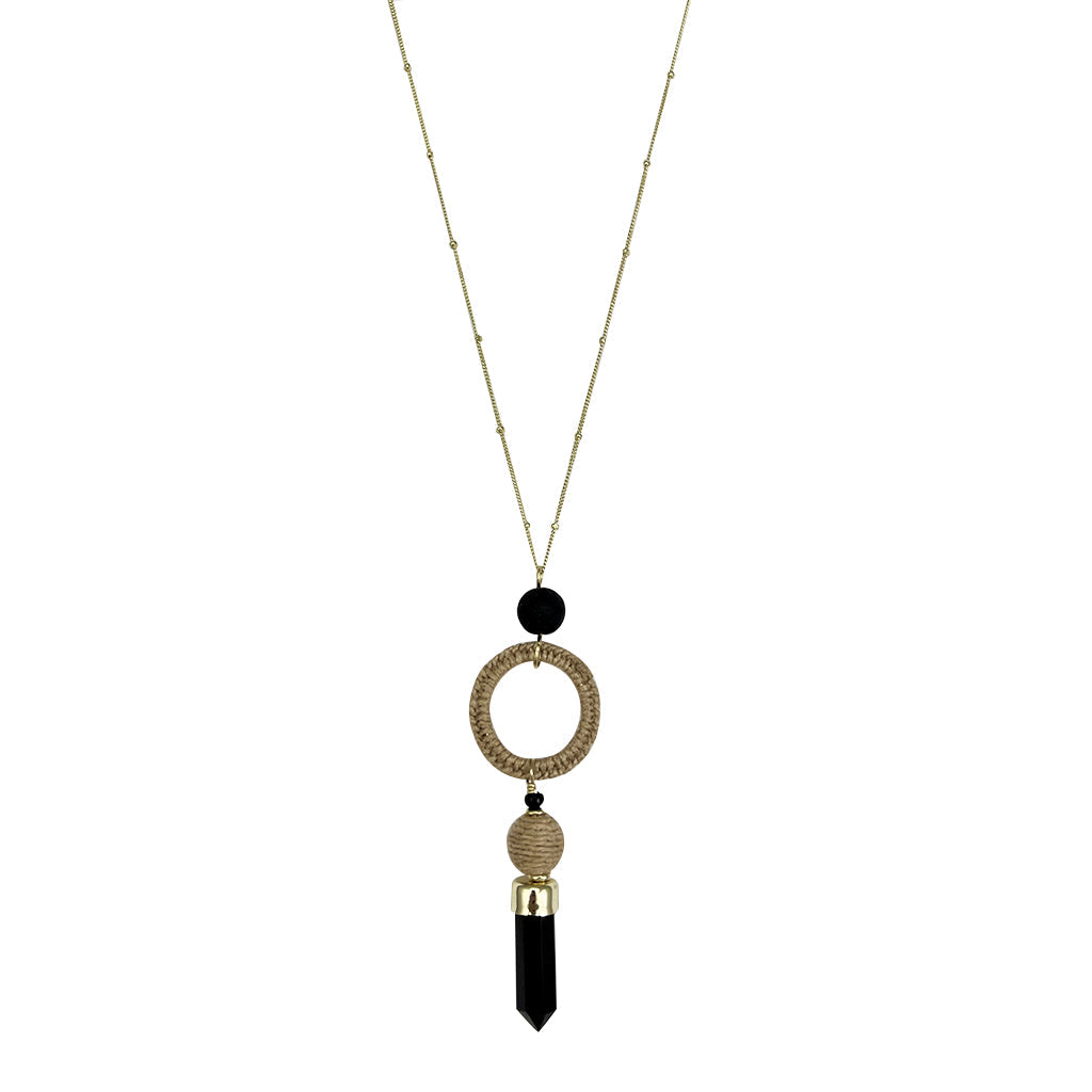 Black agate necklace with circular and cylindrical beads on a white background
