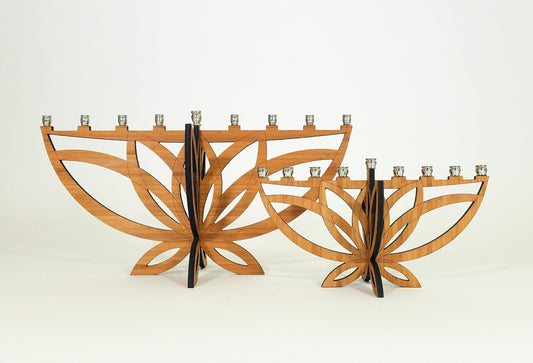 Wooden Menorah with leaf-like design on a white background