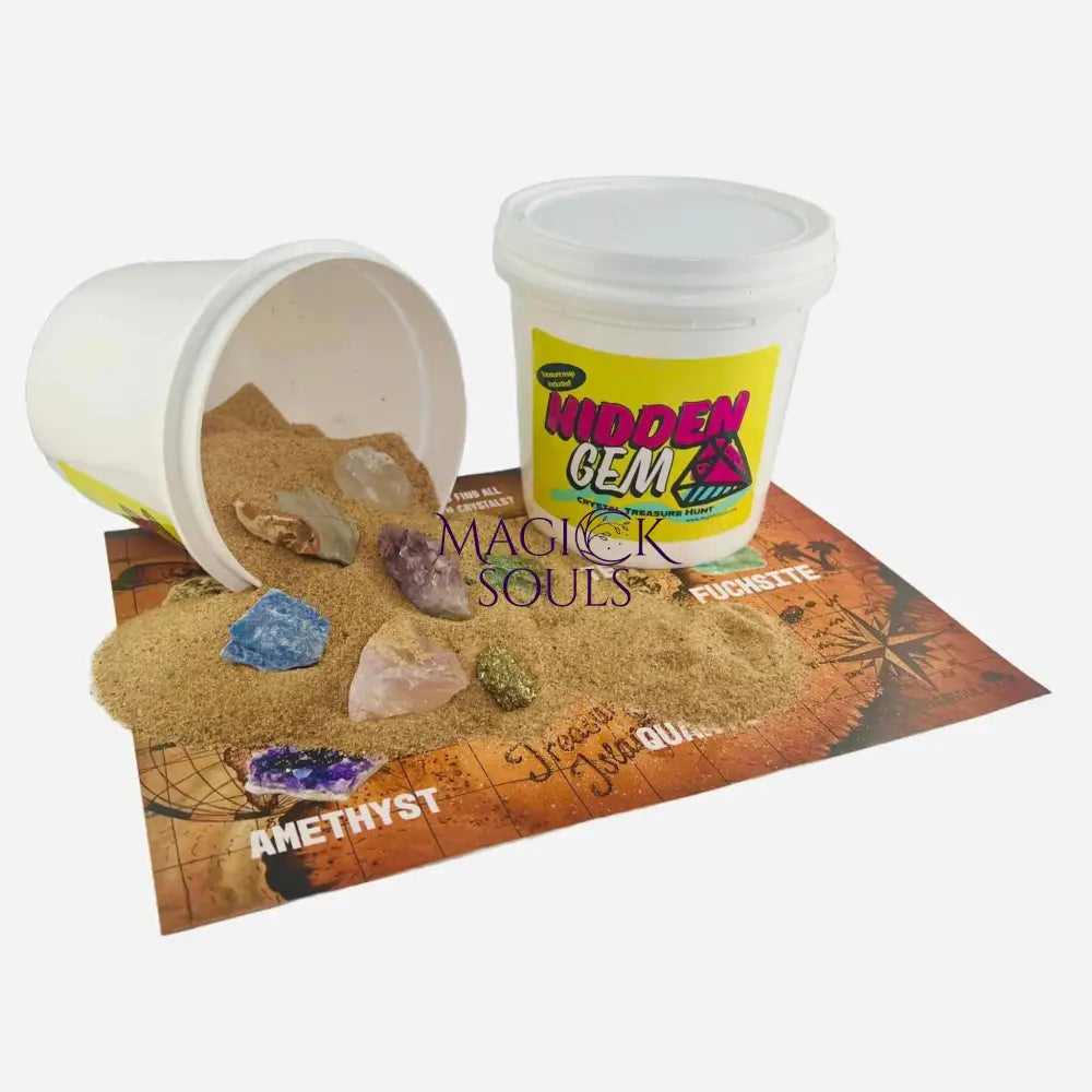 Hidden gem container with crystals on a display mat, featuring 'Magick Souls' branding.