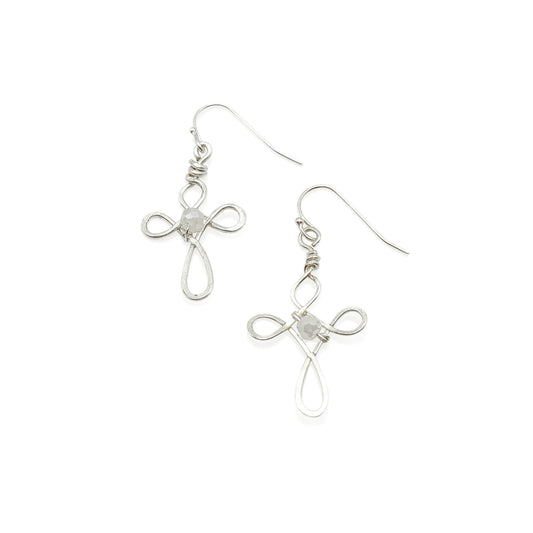 Silver cross-shaped earrings on a white background
