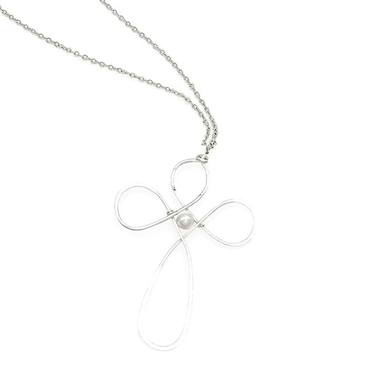 Silver necklace with a cross pendant featuring a pearl on a white background