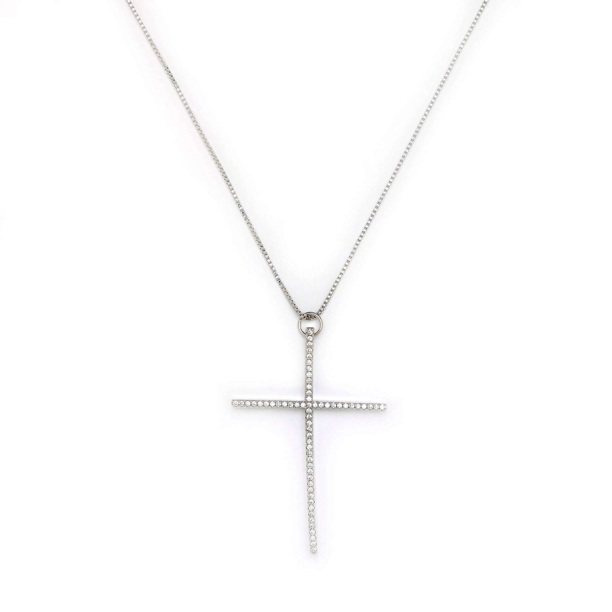 Silver cross necklace on a white background