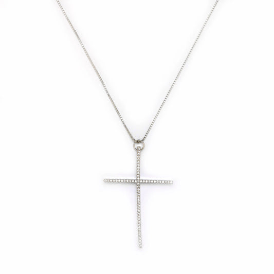 Silver cross necklace on a white background