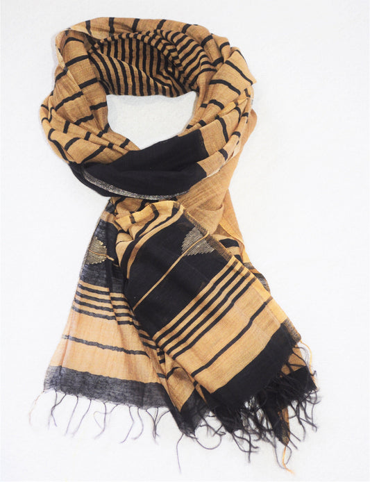 Silk scarf with black and gold pattern on a white background