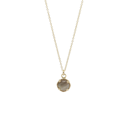 Necklace with a round agate pendant on a white background