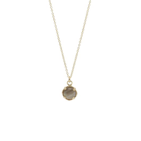Necklace with a round agate pendant on a white background