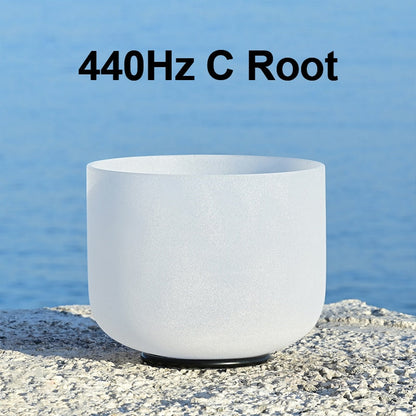 White singing bowl with '440Hz C Root' text against a blue water background
