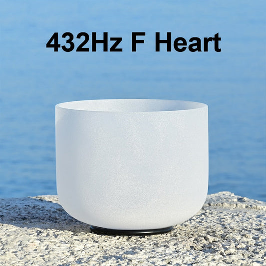 White singing bowl labeled '432Hz F Heart' on a blue water background