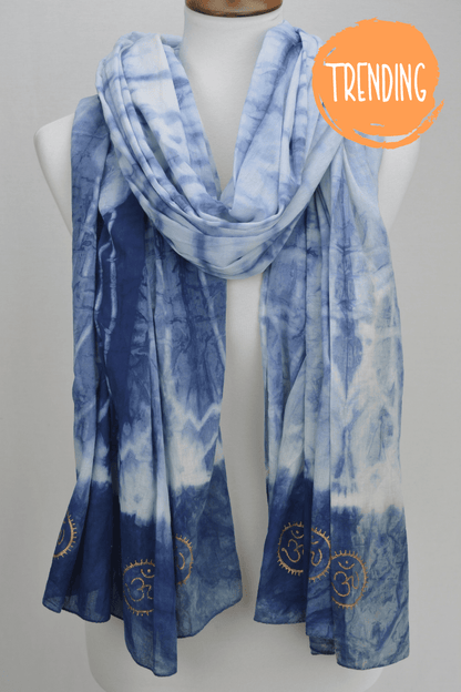 Blue tie-dye scarf on a mannequin with 'Trending' label.