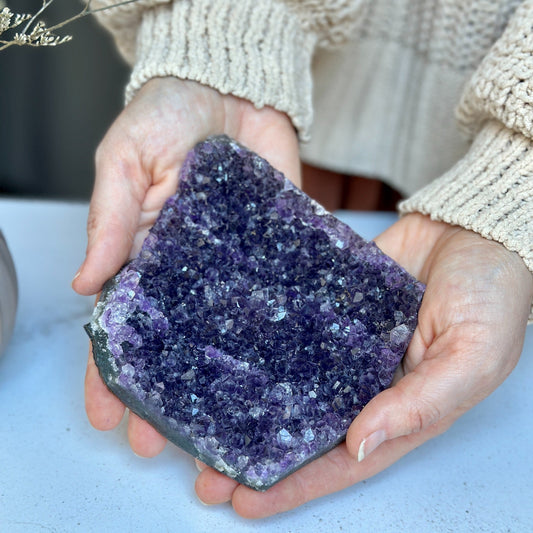 Flat amethyst crystal cluster