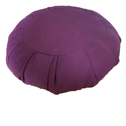 Burgundy meditation cushion on a white background