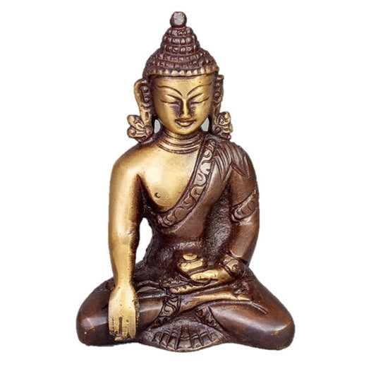 Bronze and gold Buddha statue on a white background