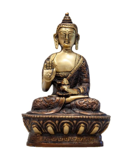Bronze Buddha on lotus in meditation pose statue on a white background