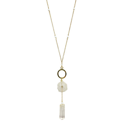 Necklace with circular pendant and crystal elements on a white background