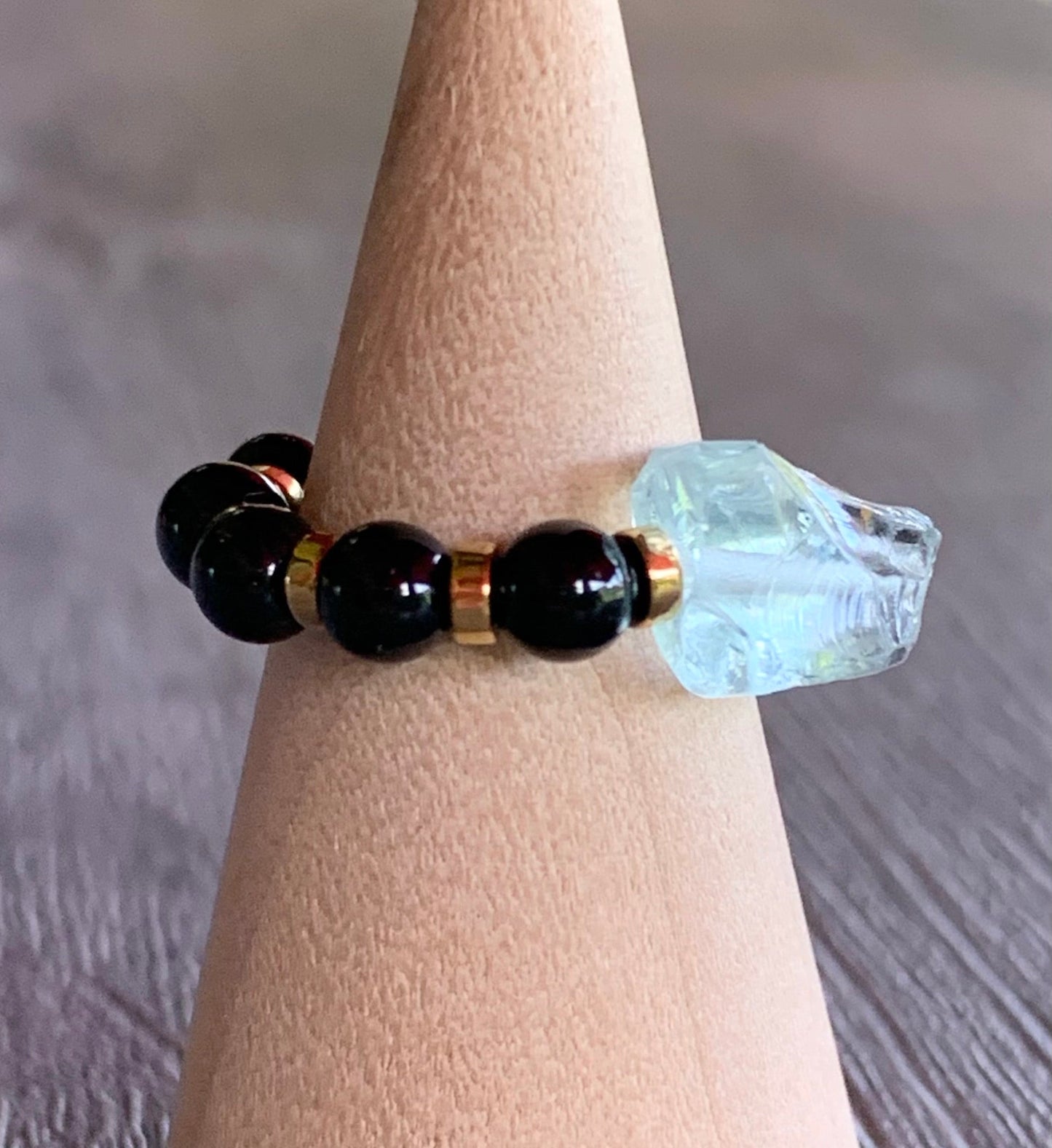 Zaida Handmade Light Blue Topaz, Black Tourmaline, and Gold Hematite Expandable Ring