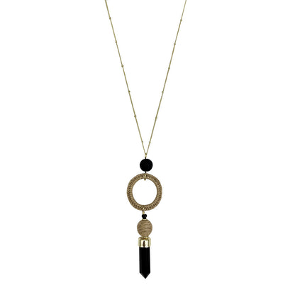 Black agate necklace with circular and cylindrical beads on a white background