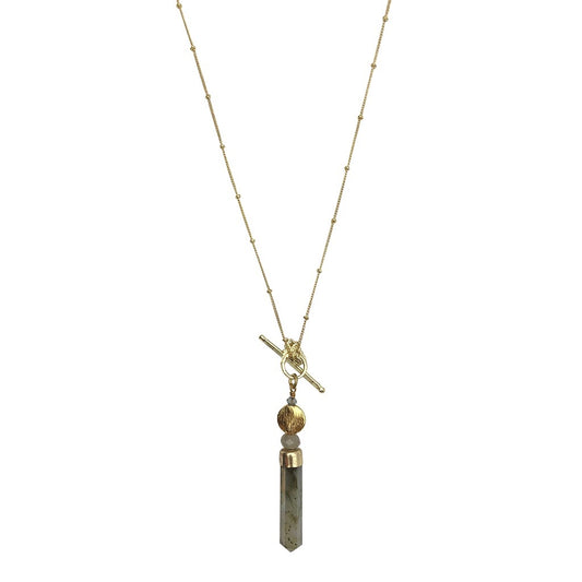 Necklace with a tassel pendant on a white background