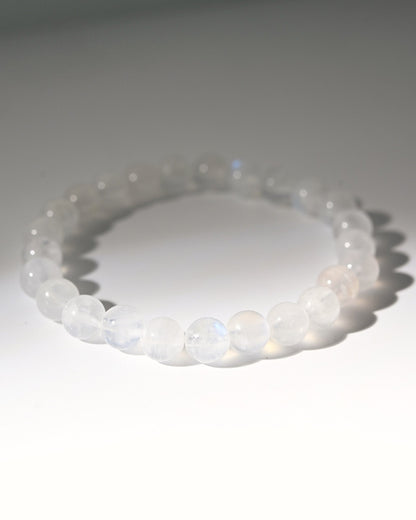 White moonstone beaded bracelet on a white background