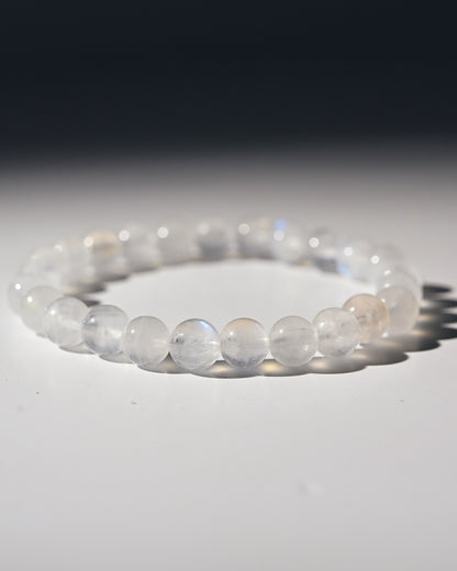 White moonstone beaded bracelet on a white background